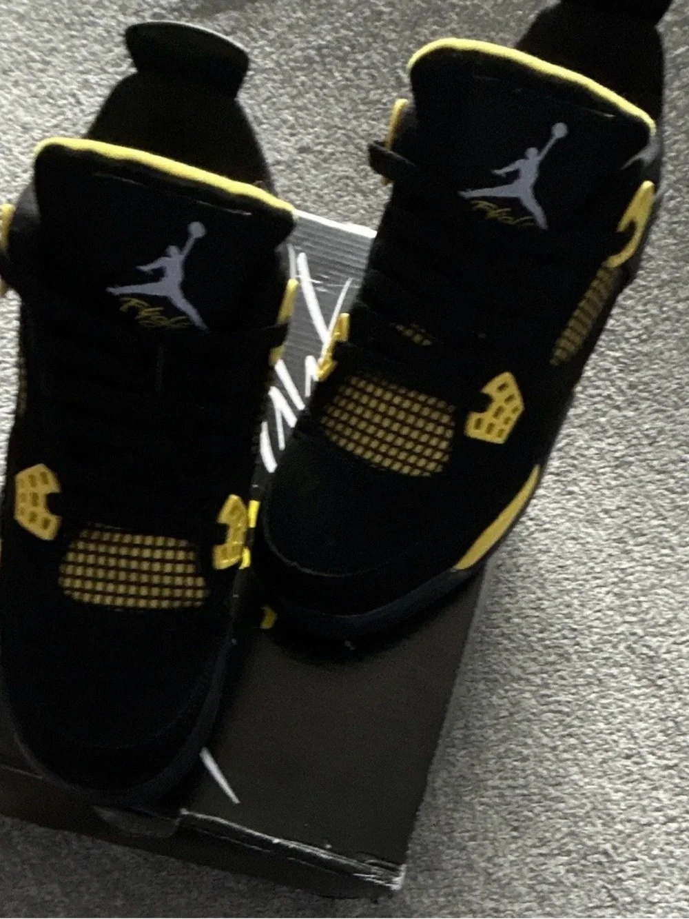 Jordan Retro 4 Black and Yellow Sneakers